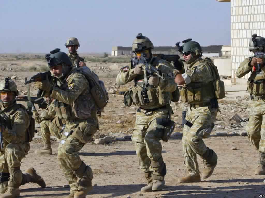 العراق: قوات الحشد الشعبى تقاتل “داعش” على الحدود المشتركة مع سوريا